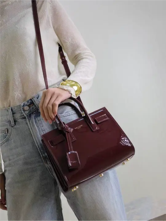 Sac De Jour burgundy patent leather handbag