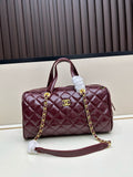 Burgundy patent leather quilted Boston bag