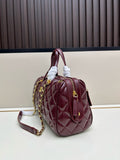 Burgundy patent leather quilted Boston bag