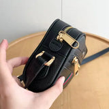 Ophidia series small black leather shoulder bag
