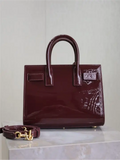Sac De Jour burgundy patent leather handbag