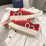 B33 Men's Low-Top Sneakers Red Smooth Calfskin with Red Oblique Jacquard| 3SN303ZDE-H331